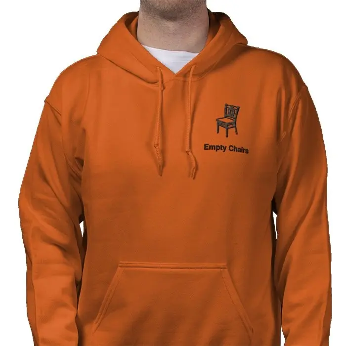 An orange Empty Chairs hoodie with the chair logo embroidered on the left of the chest